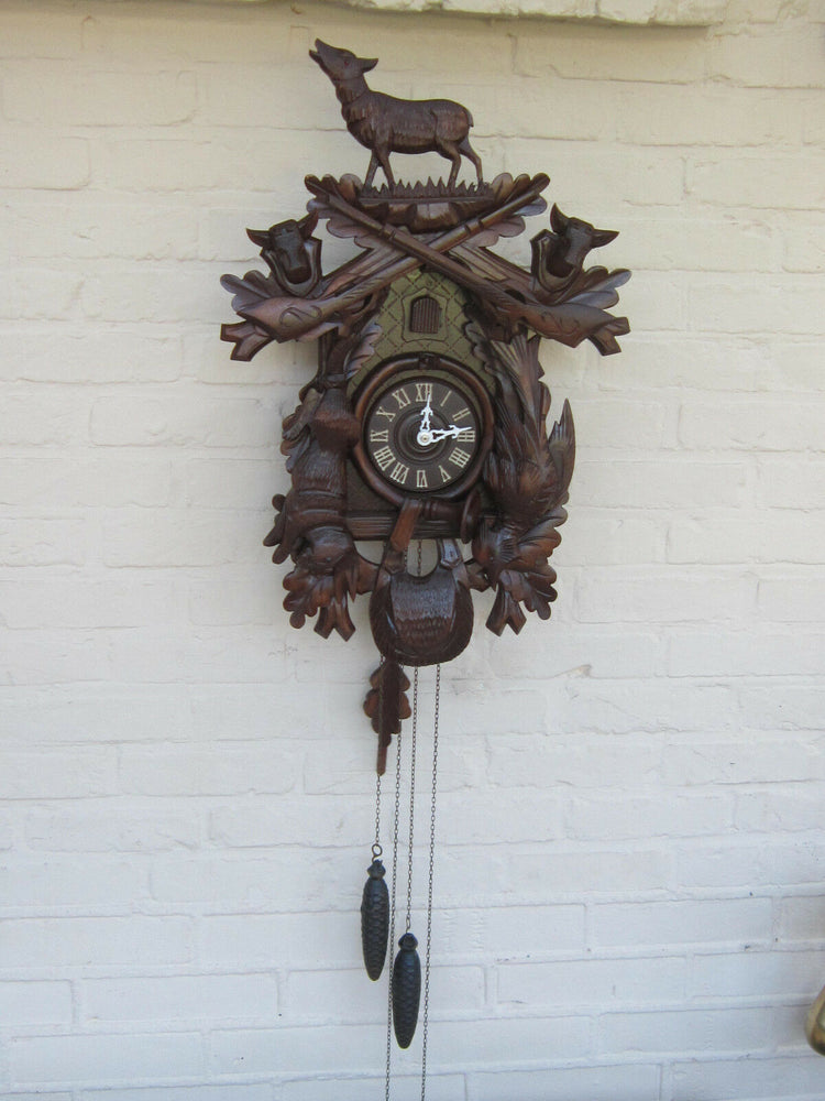 Vintage german cuckoo Wood carved black forest hunt theme Clock wall