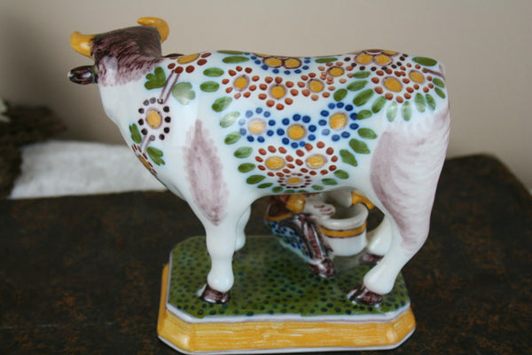 Dutch polychrome Makkum tichelaar marked girl milking cow pottery figurine
