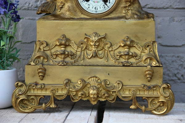 Antique french bronze gold gilt mantel clock Devil putti head couple figurines