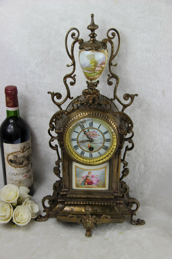 Antique Bronze Clock limoges putti porcelain plaques
