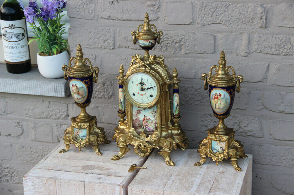 Stunning French Porcelain Clock set urns vases victorian romantic theme