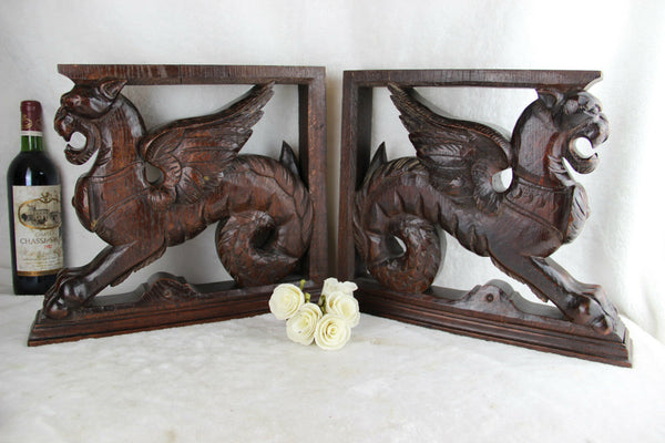 PAIR XL antique black forest wood carved Chimaera Griffin mythological figurine