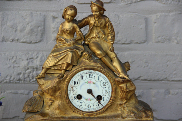 Antique french bronze gold gilt mantel clock Devil putti head couple figurines