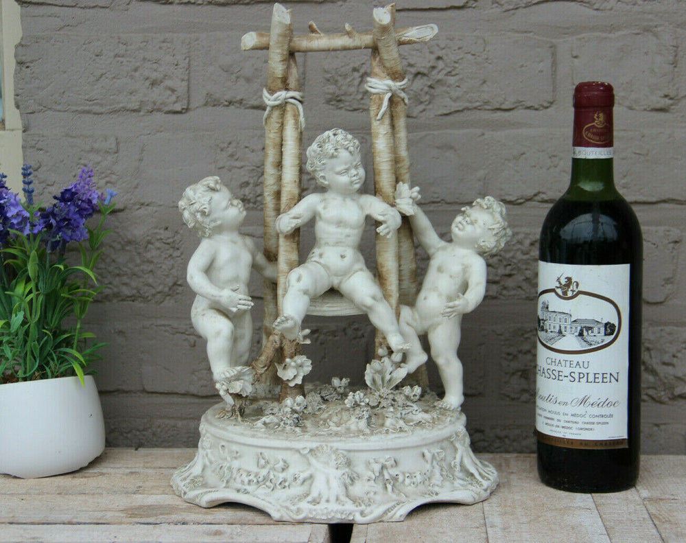 LARGE italian capodimonte marked porcelain bisque putti cherub group swing