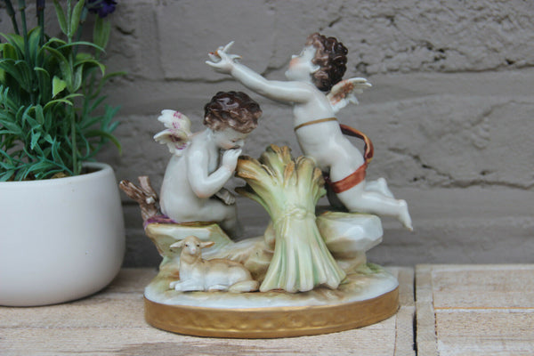 Antique German Volkstedt porcelain marked putti group figurine statue bird