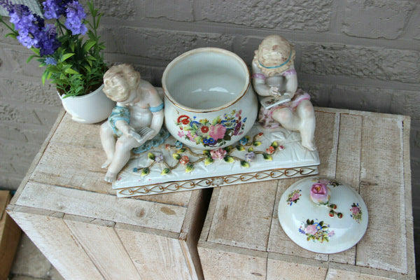 LARGE german porcelain putti figurine Centerpiece lidded Statue box floral decor