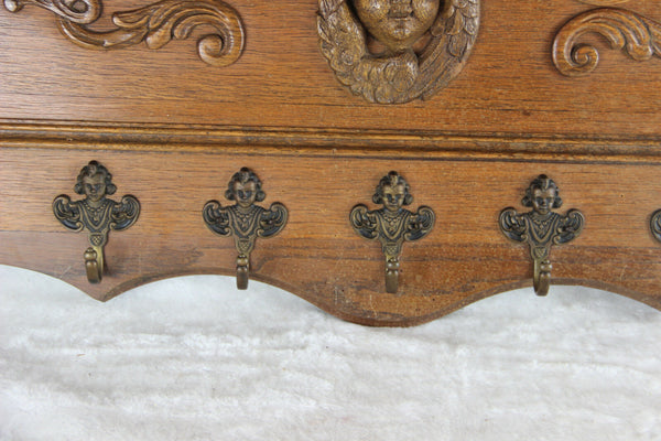 Antique Flemish wood oak carved coat rack wall putti heads 1930