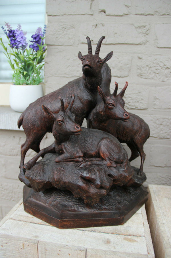Large German black Forest wood carved capricorn deer group statue 19thc