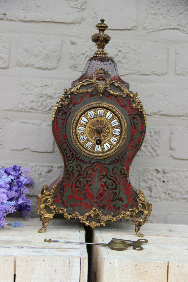 French antique boulle Devil head mantel clock