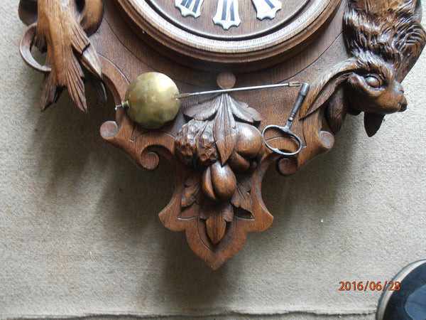 Antique Black forest wood carved hunting trophy clock fish rabbit dog 1900