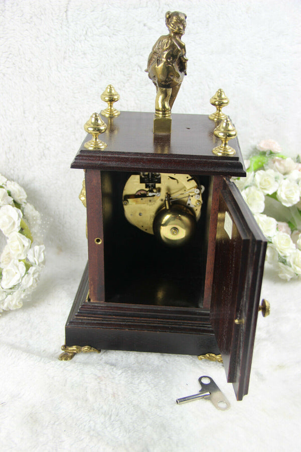 Vintage VANGESTEL Wood carved clock with bronze lady and lion heads 1970s FHS