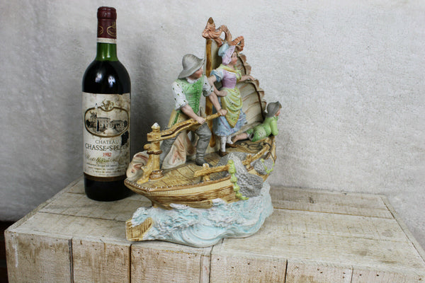 XL German bisque porcelain fishing boat family marked 1950s statue group