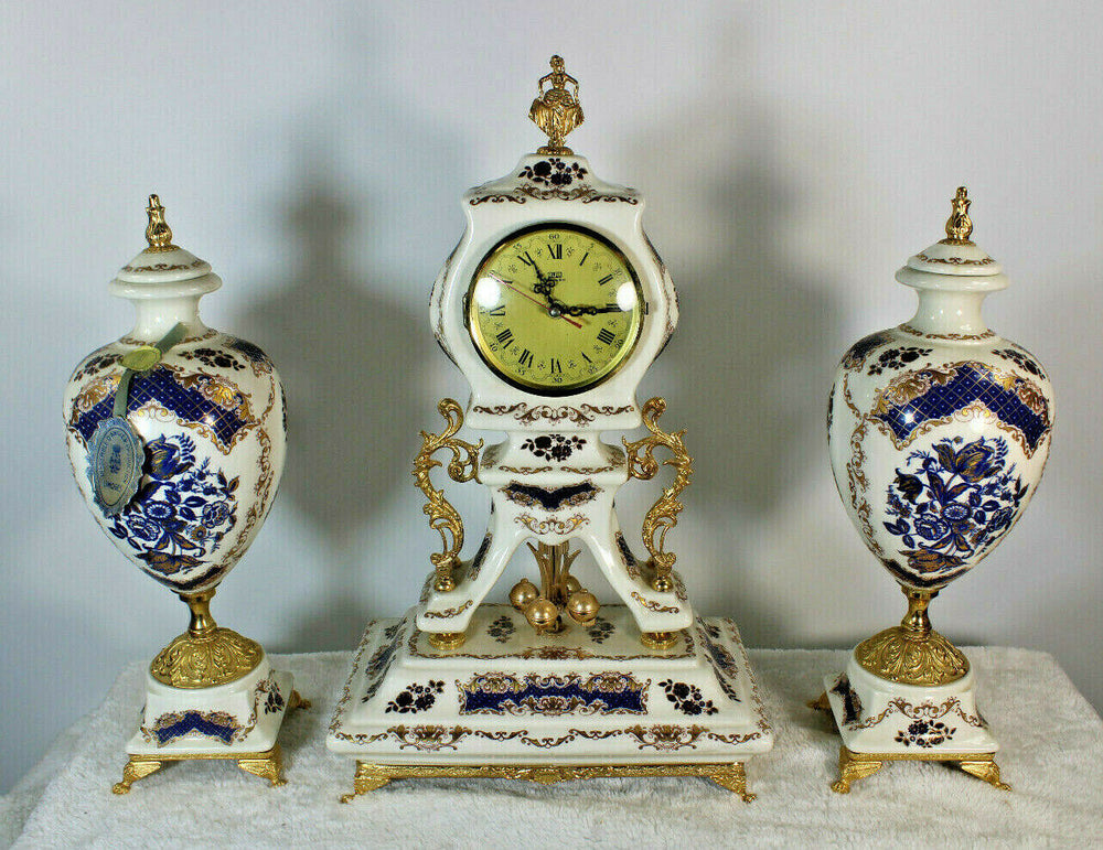Vintage Limoges porcelain mantel clock set vases marked