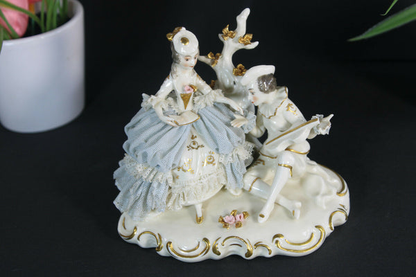 Antique german marked porcelain small porcelain lace group statue