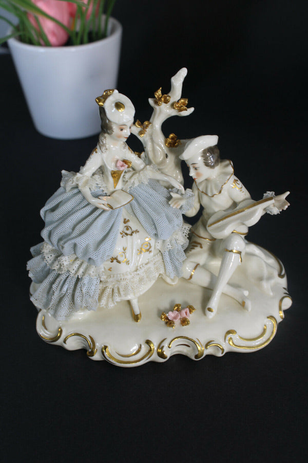 Antique german marked porcelain small porcelain lace group statue