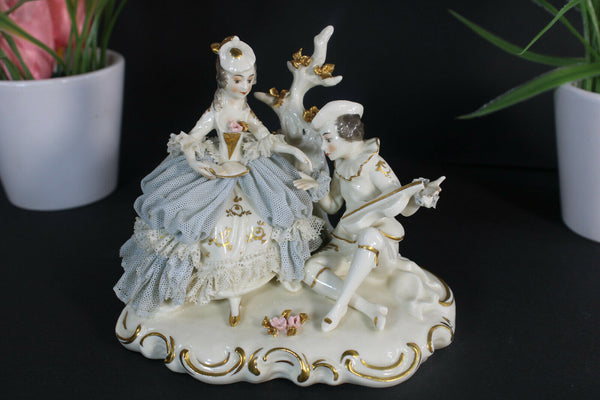 Antique german marked porcelain small porcelain lace group statue