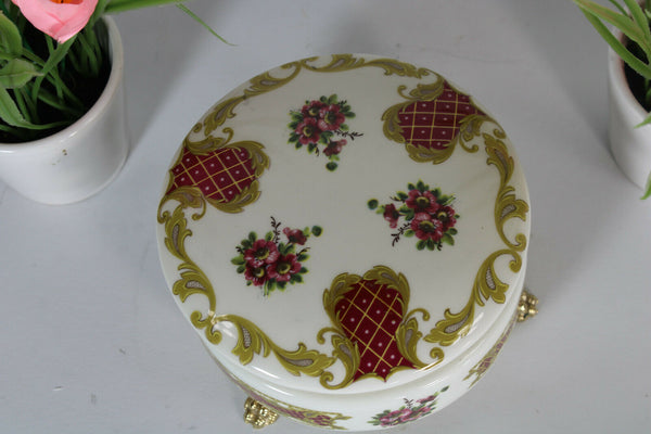Italian porcelain floral porcelain bonbonniere box lion paws marked