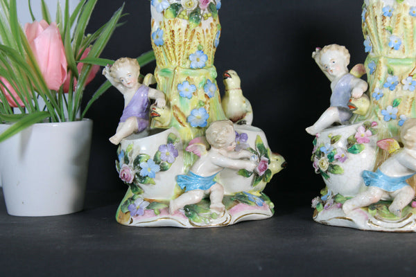 PAIR French porcelain faience putti angels cherub birds statue