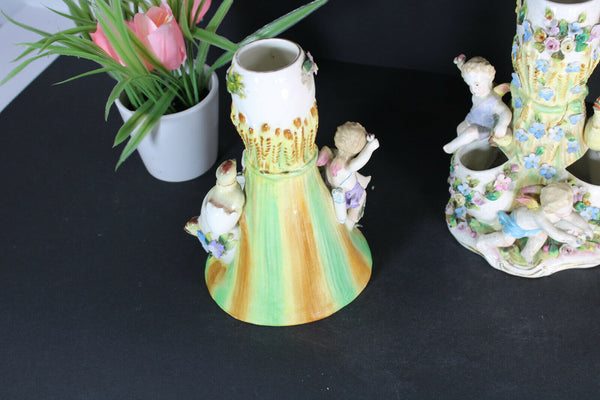 PAIR French porcelain faience putti angels cherub birds statue