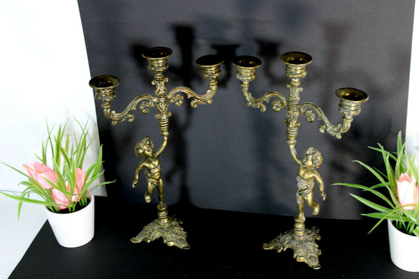 PAIR vintage bronze putti cherub figurine candle holders