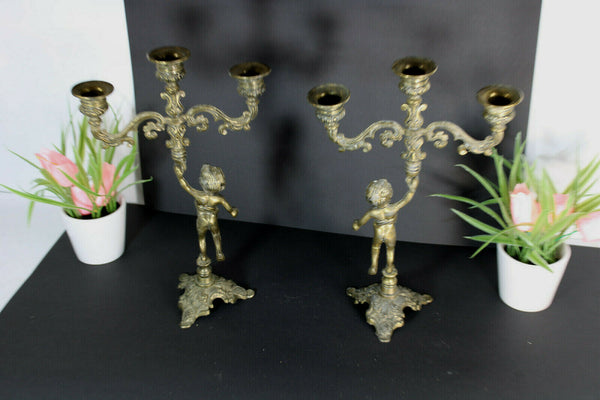 PAIR vintage bronze putti cherub figurine candle holders