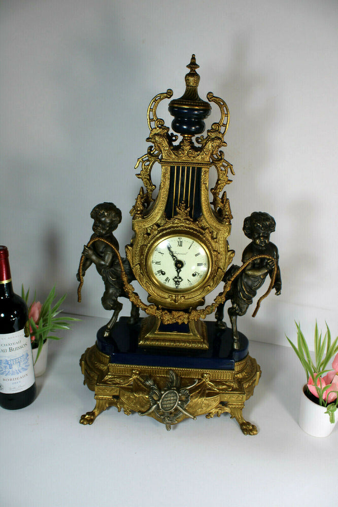 Vintage bronze faun cherub figurine mantel clock imperial FHS movement