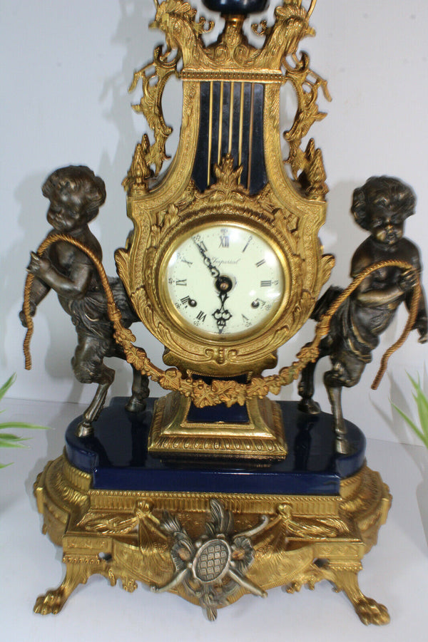 Vintage bronze faun cherub figurine mantel clock imperial FHS movement