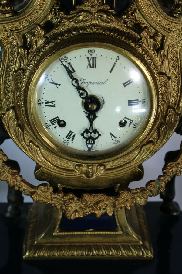 Vintage bronze faun cherub figurine mantel clock imperial FHS movement