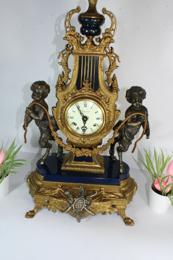 Vintage bronze faun cherub figurine mantel clock imperial FHS movement