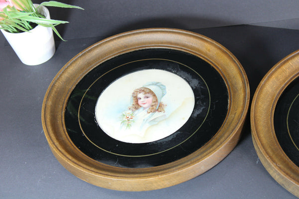 PAIR girl portrait on paper behind glass wood round wall frame panels
