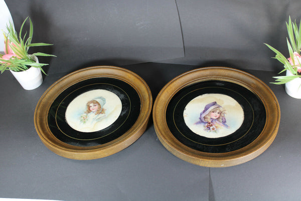 PAIR girl portrait on paper behind glass wood round wall frame panels