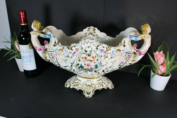 Italian Capodimonte porcelain marked centerpiece caryatid cherub putti bowl