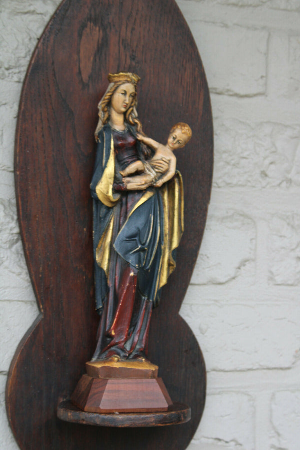 Vintage german wood carved polychrome madonna figurine on wall console