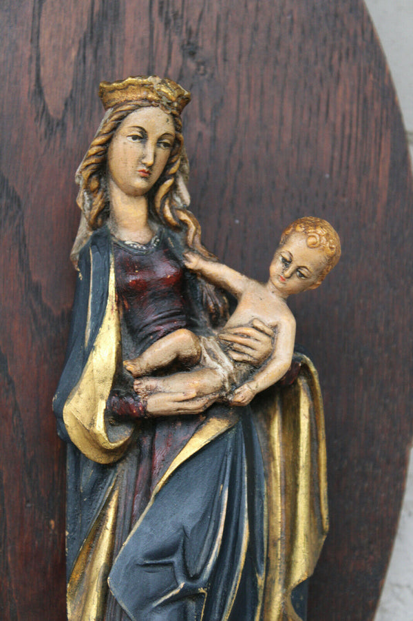 Vintage german wood carved polychrome madonna figurine on wall console