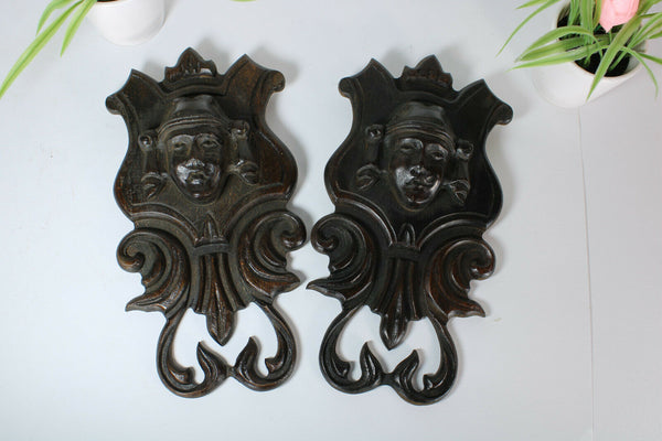 pair antique breton wood carved black lacquered portrait heads wall plaques