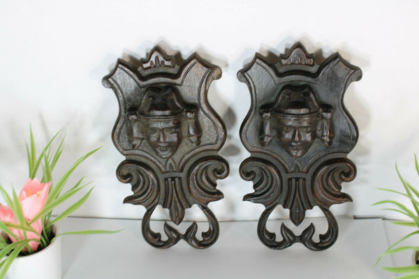 pair antique breton wood carved black lacquered portrait heads wall plaques