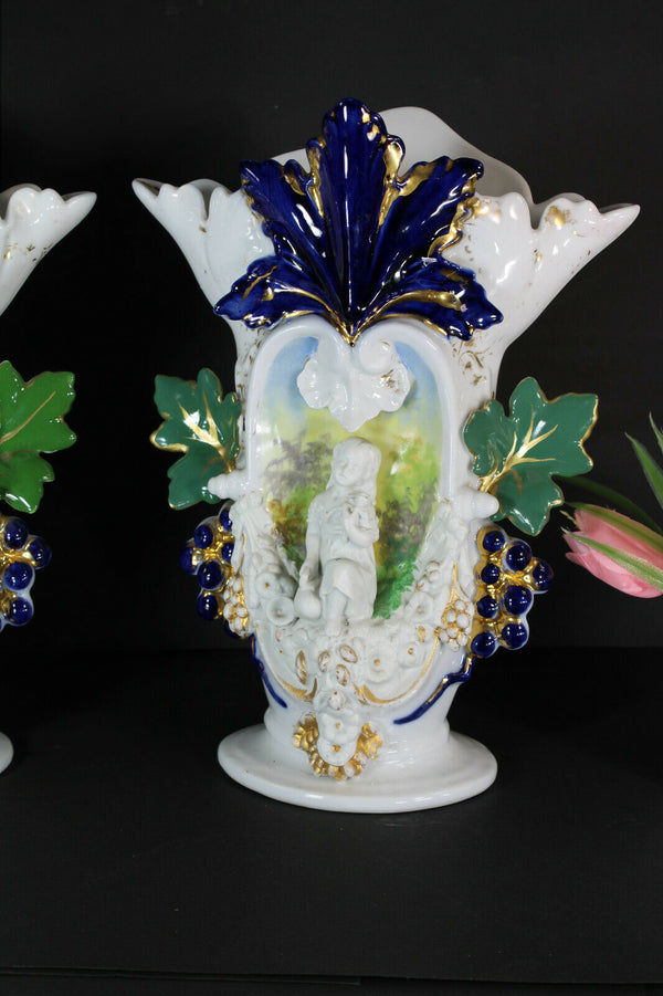 Antique pair vieux paris porcelain boy girl figural Floral vases 1900s