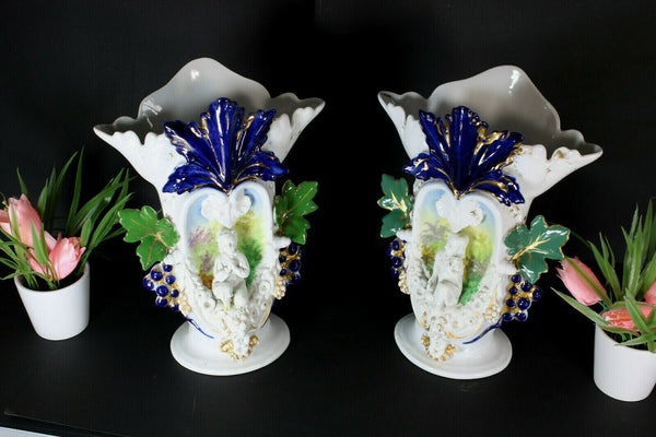 Antique pair vieux paris porcelain boy girl figural Floral vases 1900s