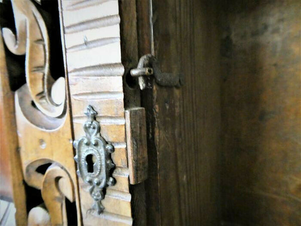 Antique German black forest wood carved apothecary wall cabinet man lady fig