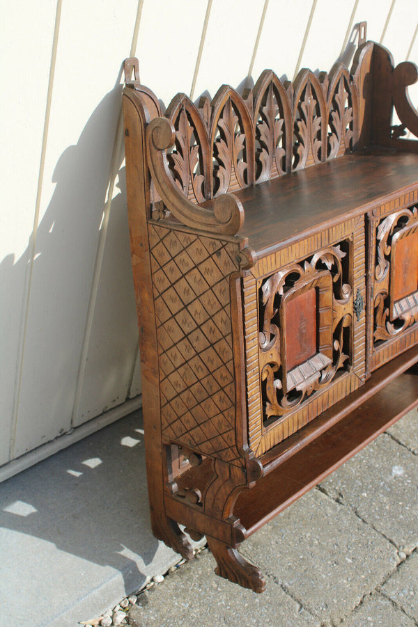 Antique German black forest wood carved apothecary wall cabinet man lady fig