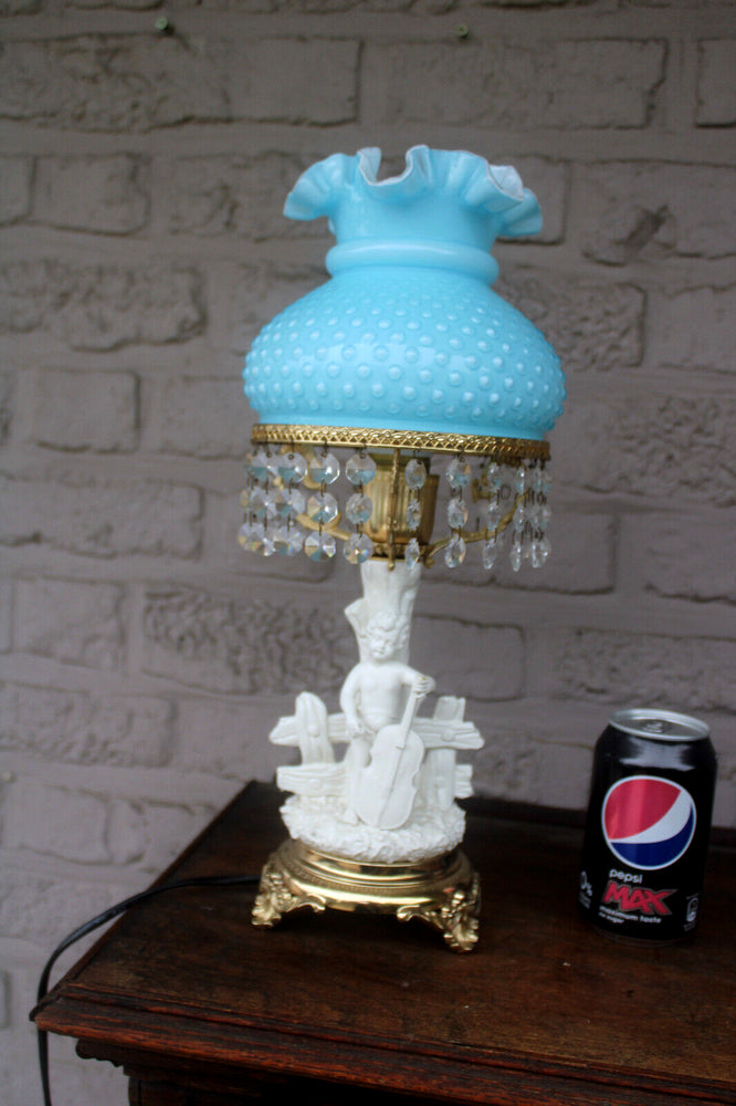 Vintage white porcelain figural lamp turquoise glass shade