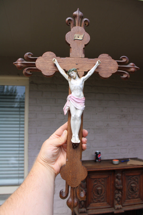 Antique French wood carved crucifix fleur de lys bisque porcelain corpus
