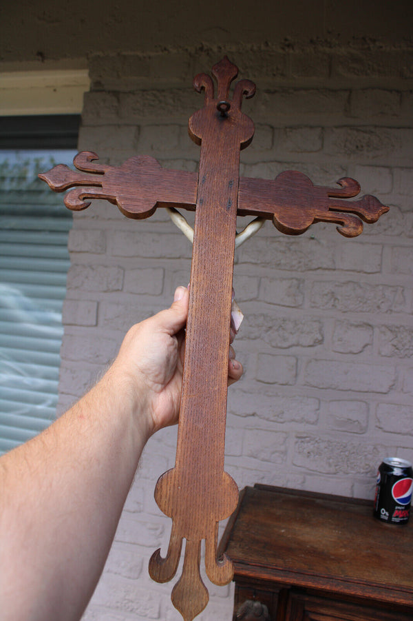 Antique French wood carved crucifix fleur de lys bisque porcelain corpus