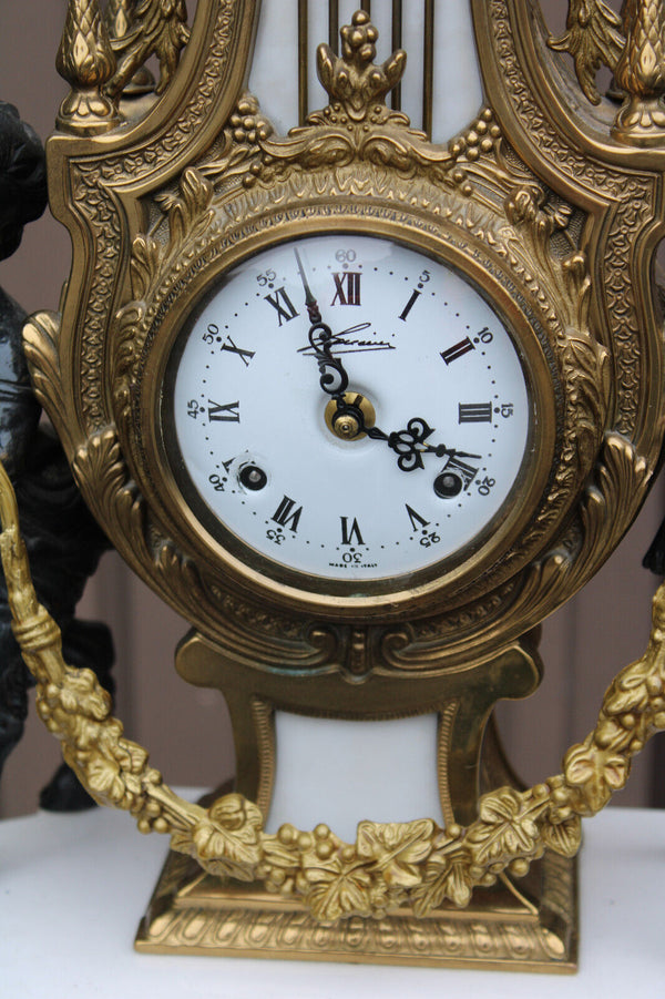 Vintage bronze marble white faun putti cherub figural mantel clock