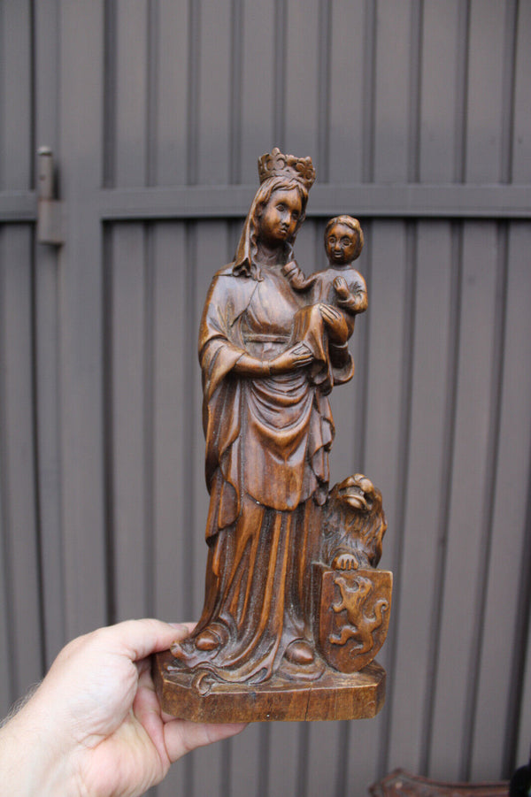 Antique wood carved our lady of Flanders statue religious lion
