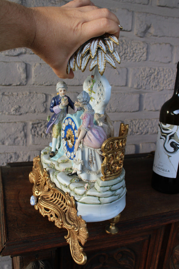Gorgeous porcelain mantel clock romantic couple palm tree 1970