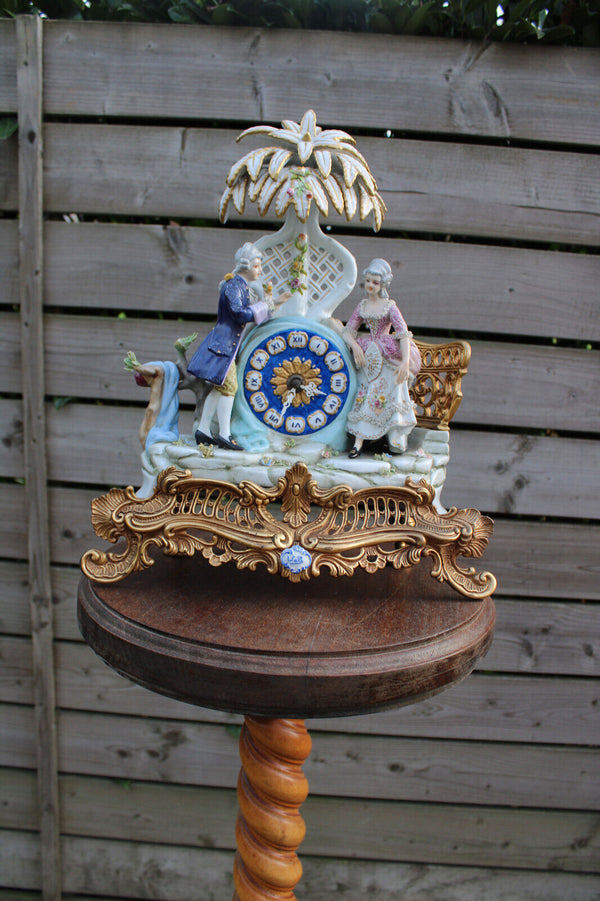 Gorgeous porcelain mantel clock romantic couple palm tree 1970
