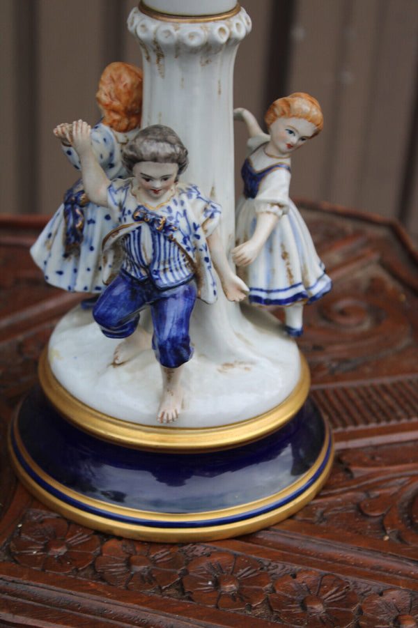PAIR antique German porcelain candelabras children figural playing decor rare