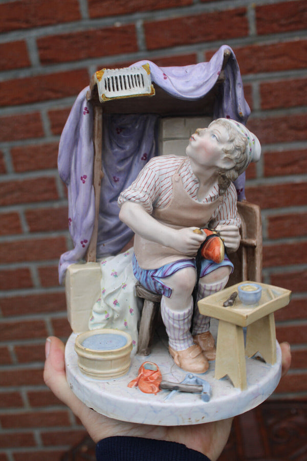 Vintage italian capodimonte porcelain shoe maker statue figurine