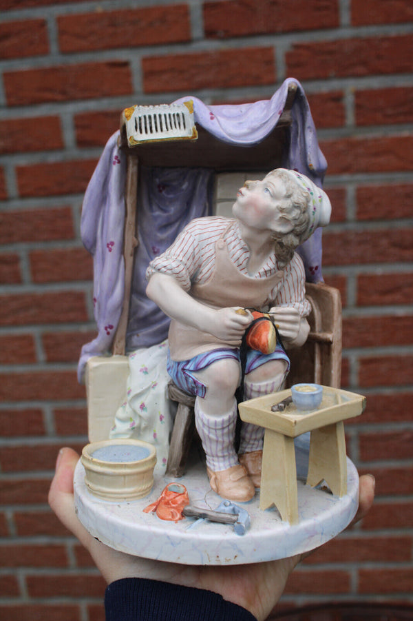Vintage italian capodimonte porcelain shoe maker statue figurine